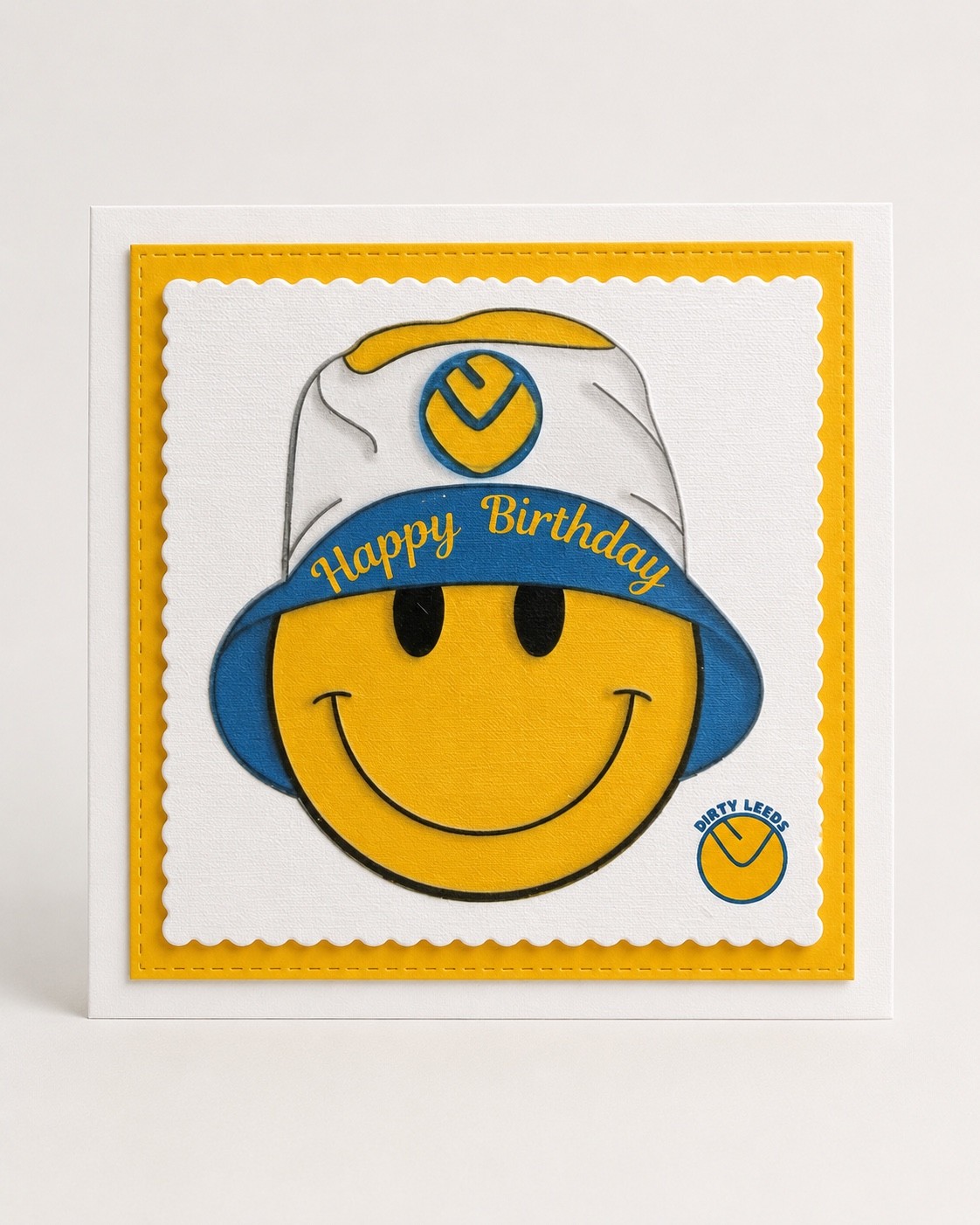 Handmade Dirty Leeds® Yellow Smiley Bucket Hat Happy Birthday Card front view.