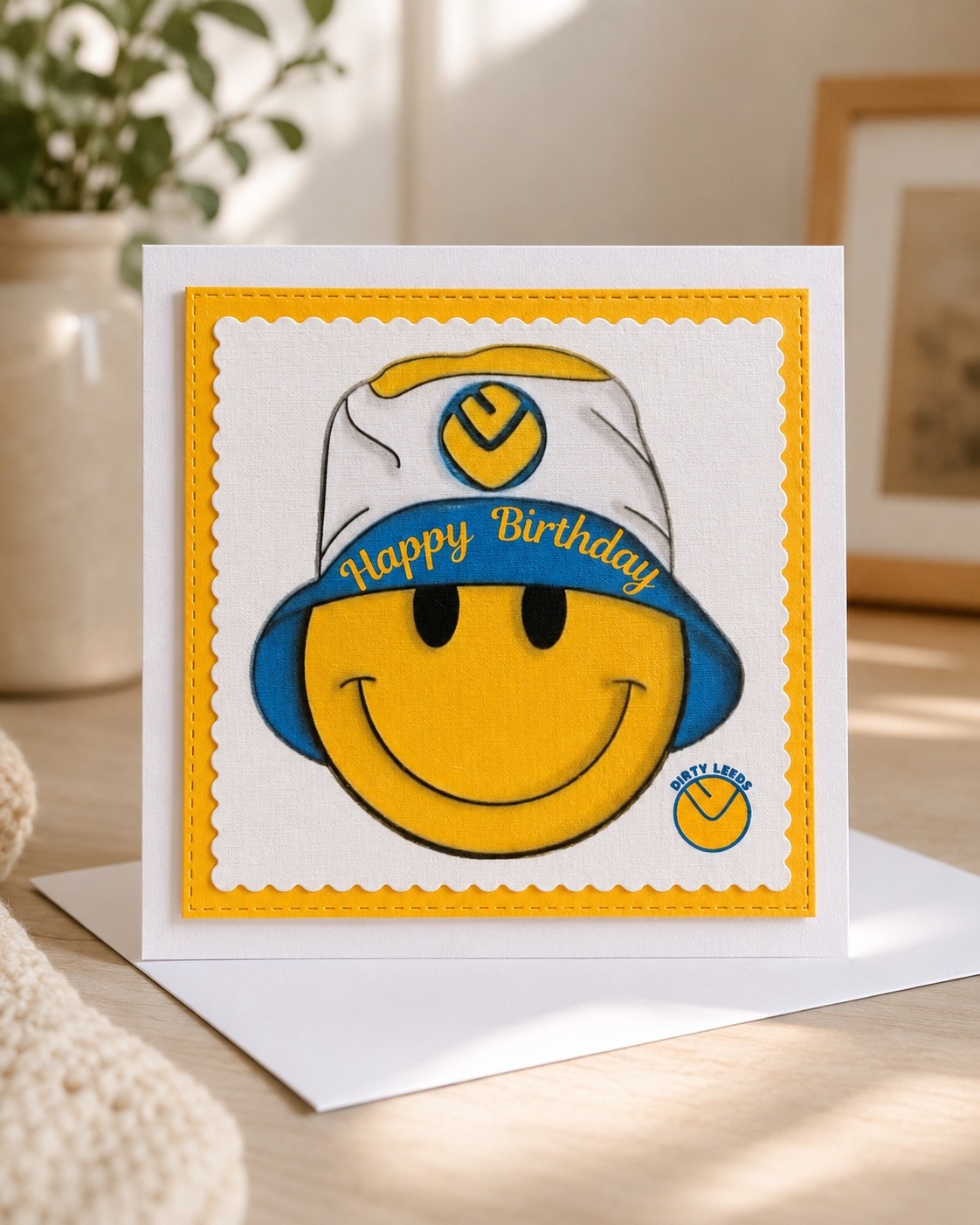 Dirty Leeds® Yellow Smiley Bucket Hat Happy Birthday Card – lifestyle image.