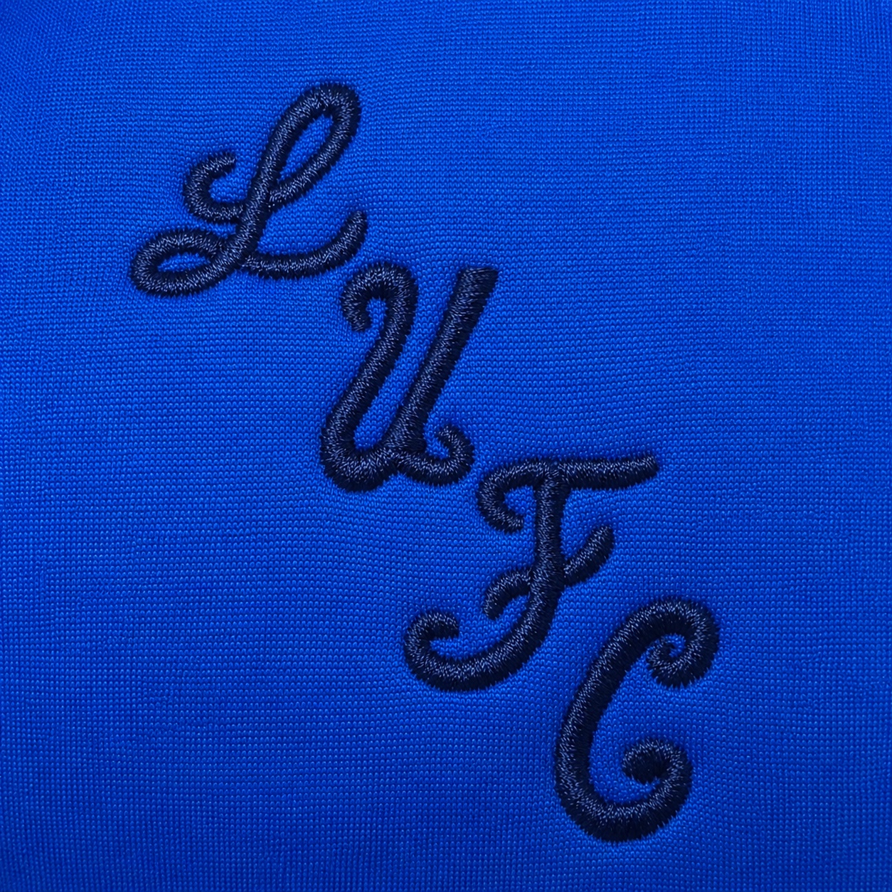 Dirty Leeds® Blue Yorkshire Rose Scuba Hoodie – back view, embroidery close-up.