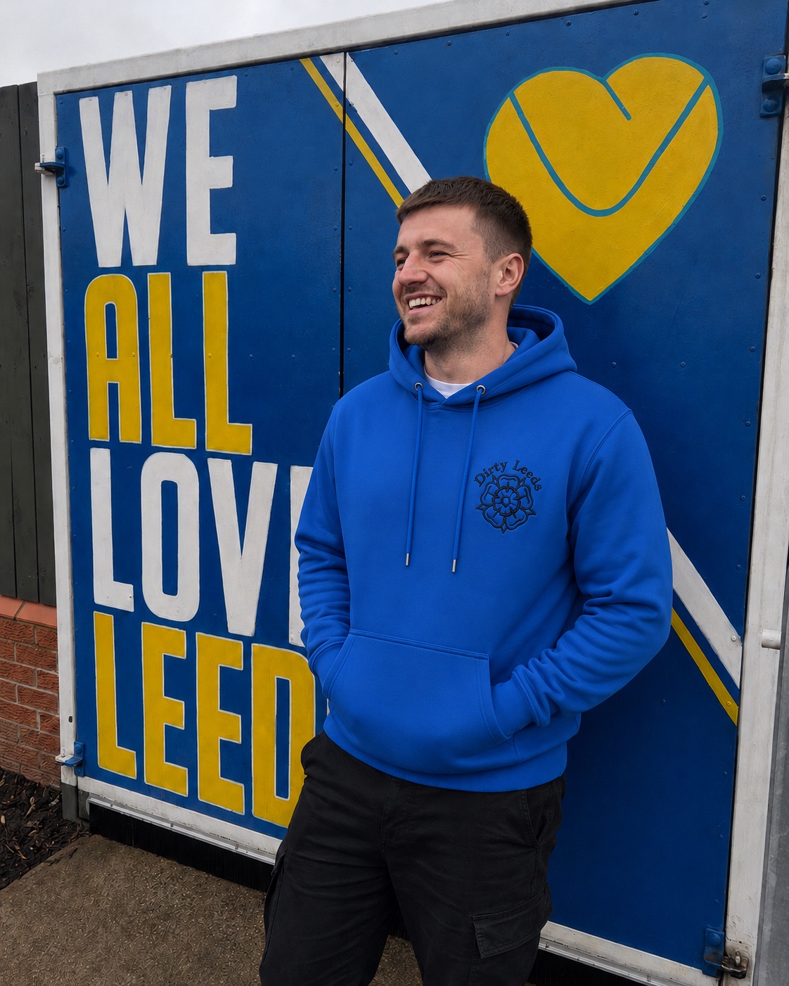 Dirty Leeds® Blue Yorkshire Rose Scuba Hoodie – lifestyle image.