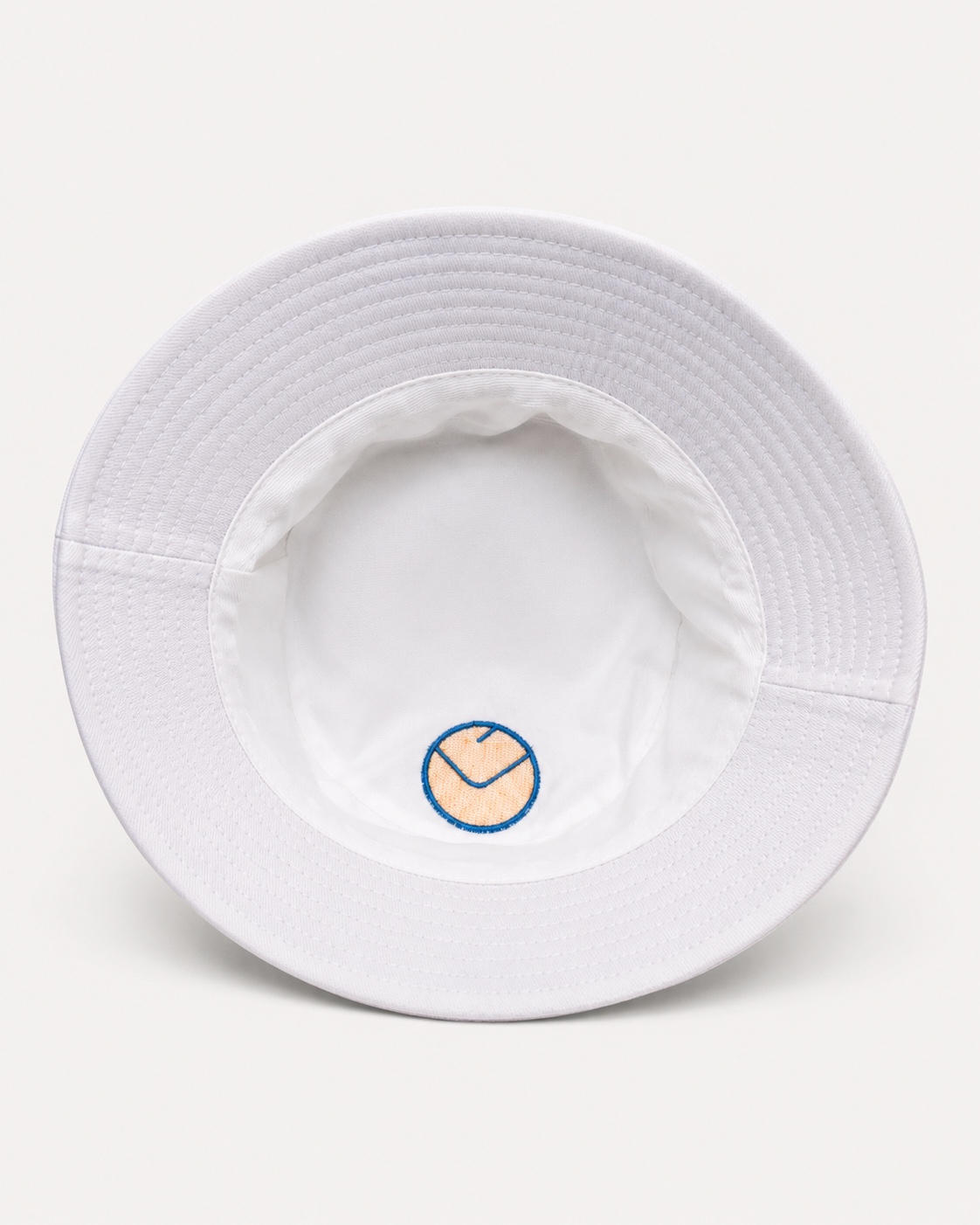Dirty Leeds® Leeds United Smiley Badge White Bucket Hat – side view, inside view.