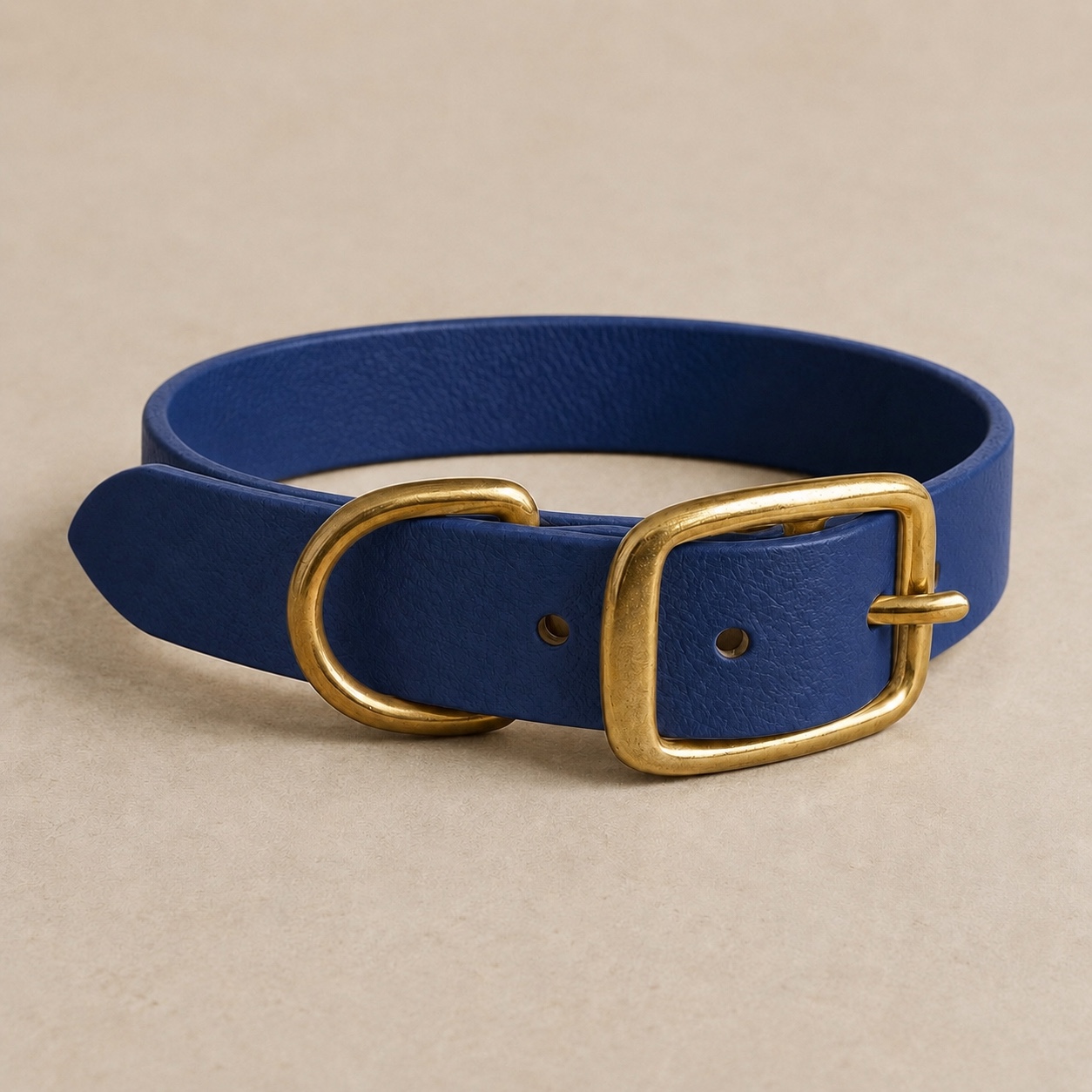 Front view of the Dirty Leeds® navy made-to-measure dog collar with solid brass buckle and D-ring.