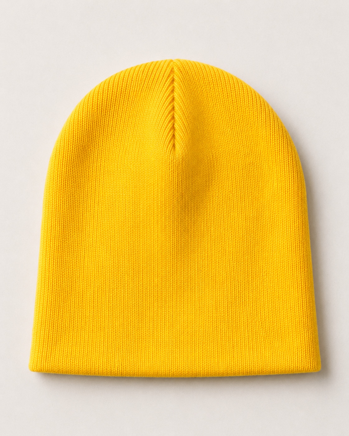 Dirty Leeds® Smiley Badge Yellow Beanie Hat – back view.