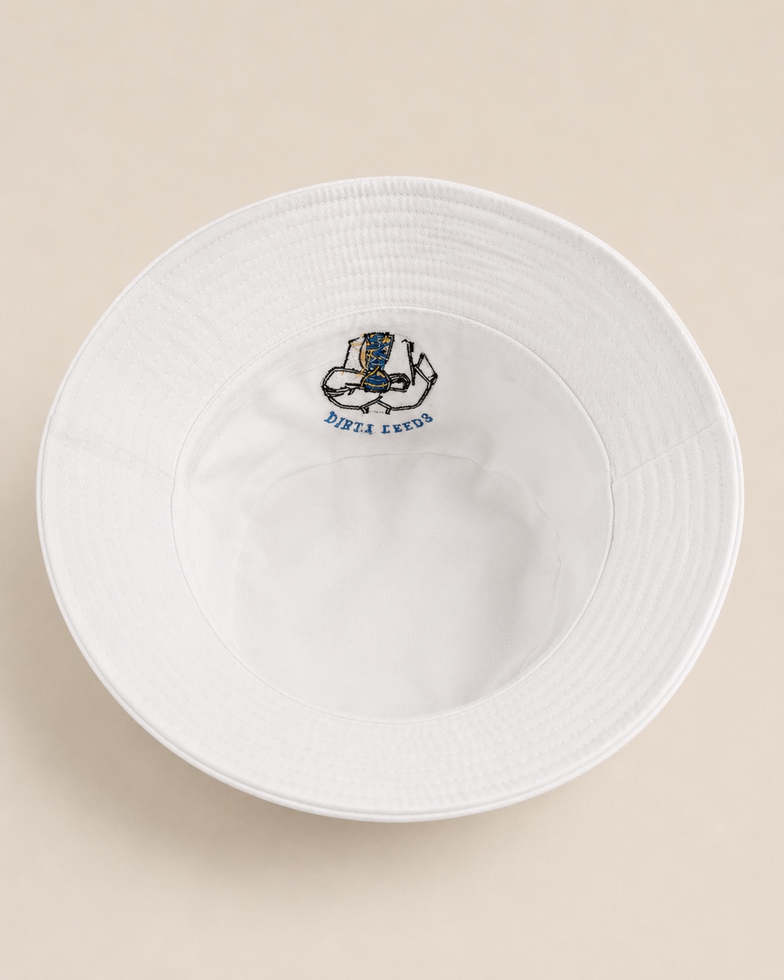 Dirty Leeds® White Bucket Hat – side view, inside view.