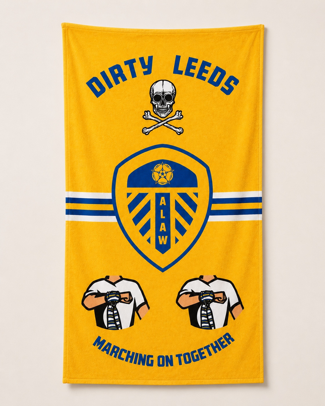 Yellow Dirty Leeds® beach towel shown flat against a light stone background.